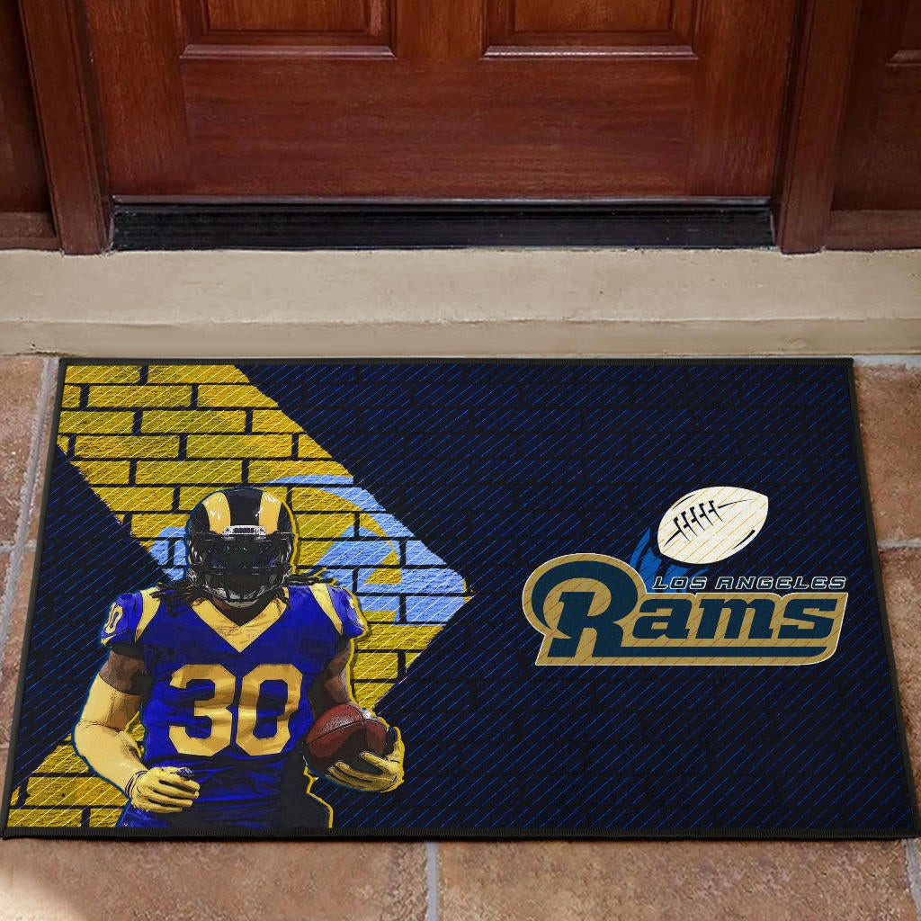 Los Angeles Rams American Football Raymond Calais 30 Holding Rugby Ball Brick Background Rubber Doormat Home Decor